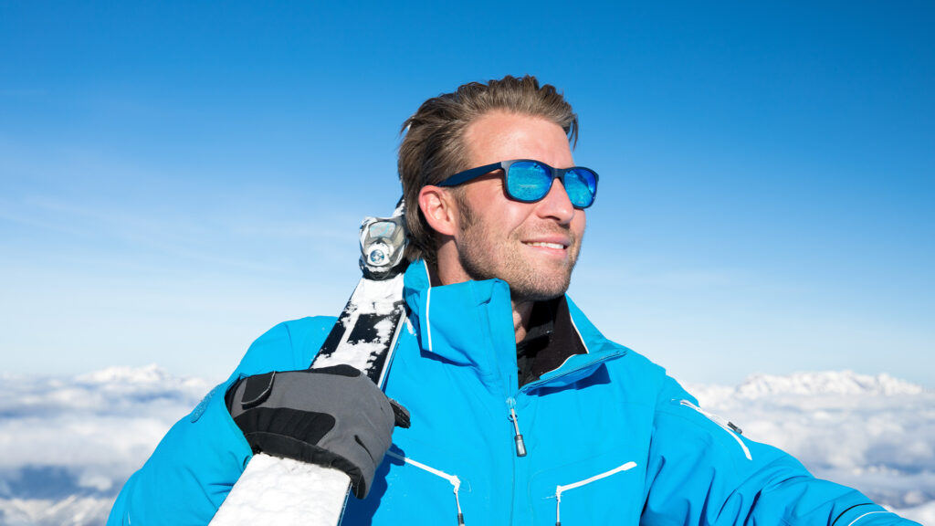 Skier with sports glasses