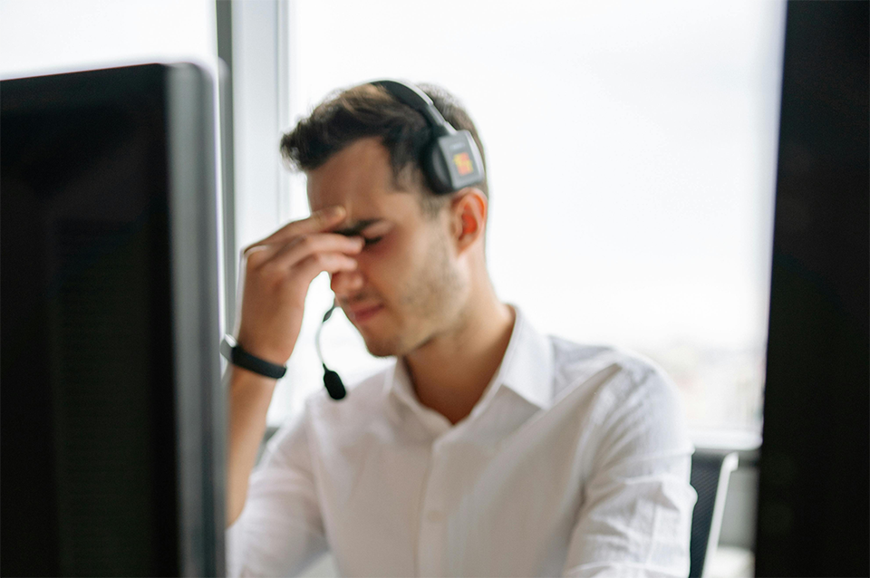 Man rubbing his eyes