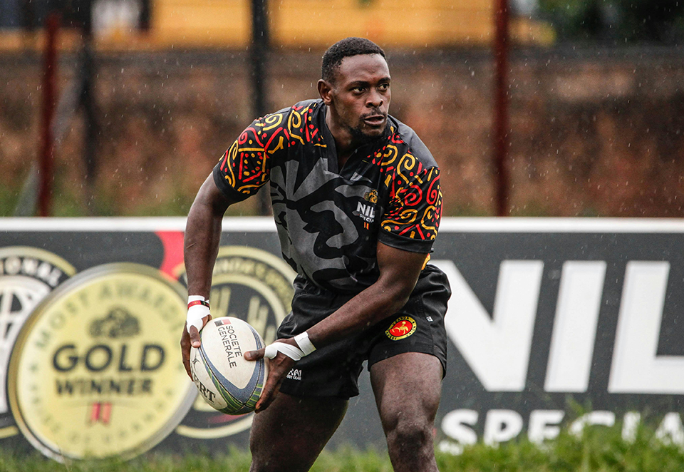 man playing rugby