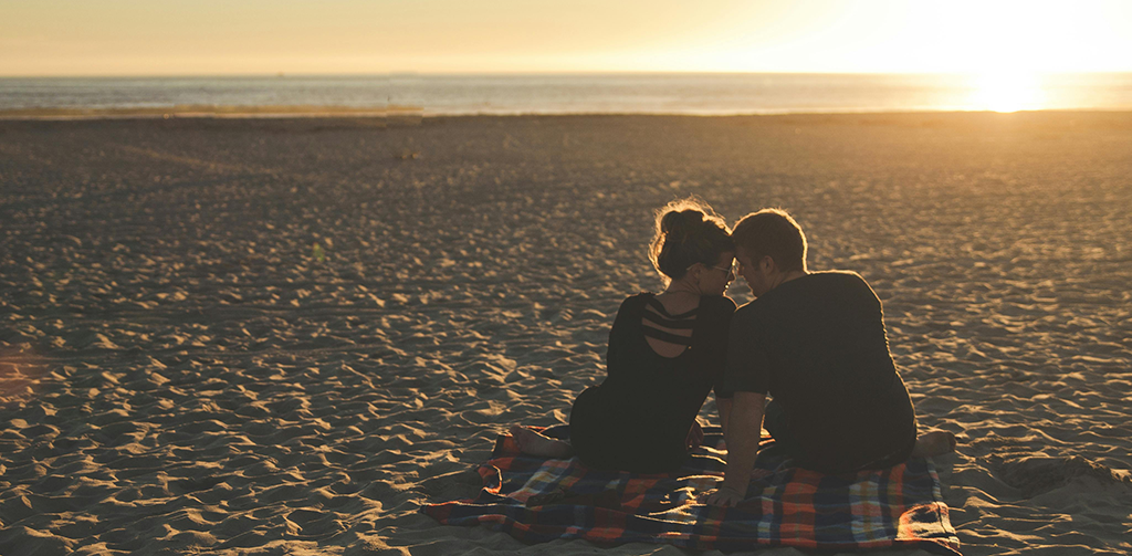 couple on date on beach