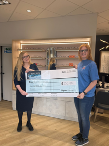 Hannah receiving cheque
